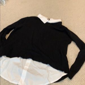 Black sweater with white collar
